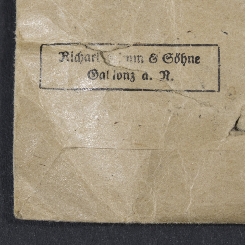 Close-up of maker mark on back of bag for WW2 Black Wound Badge