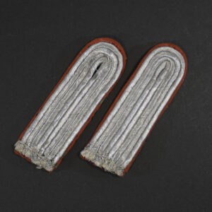 Front view of Luftwaffe Leutnant Flak officer shoulder boards with red piping, soft wool sewn-in type