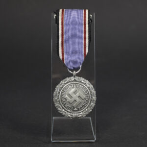 WW2 German Air defence 2nd class medal overview showing medal with ribbon for air raid protection service