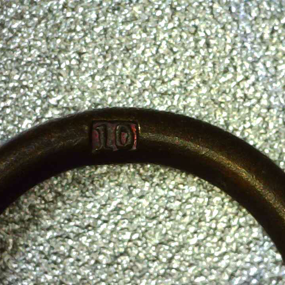 Close-up of ring marked 10 (Förster & Barth) on WW2 German War Merit Cross with Swords