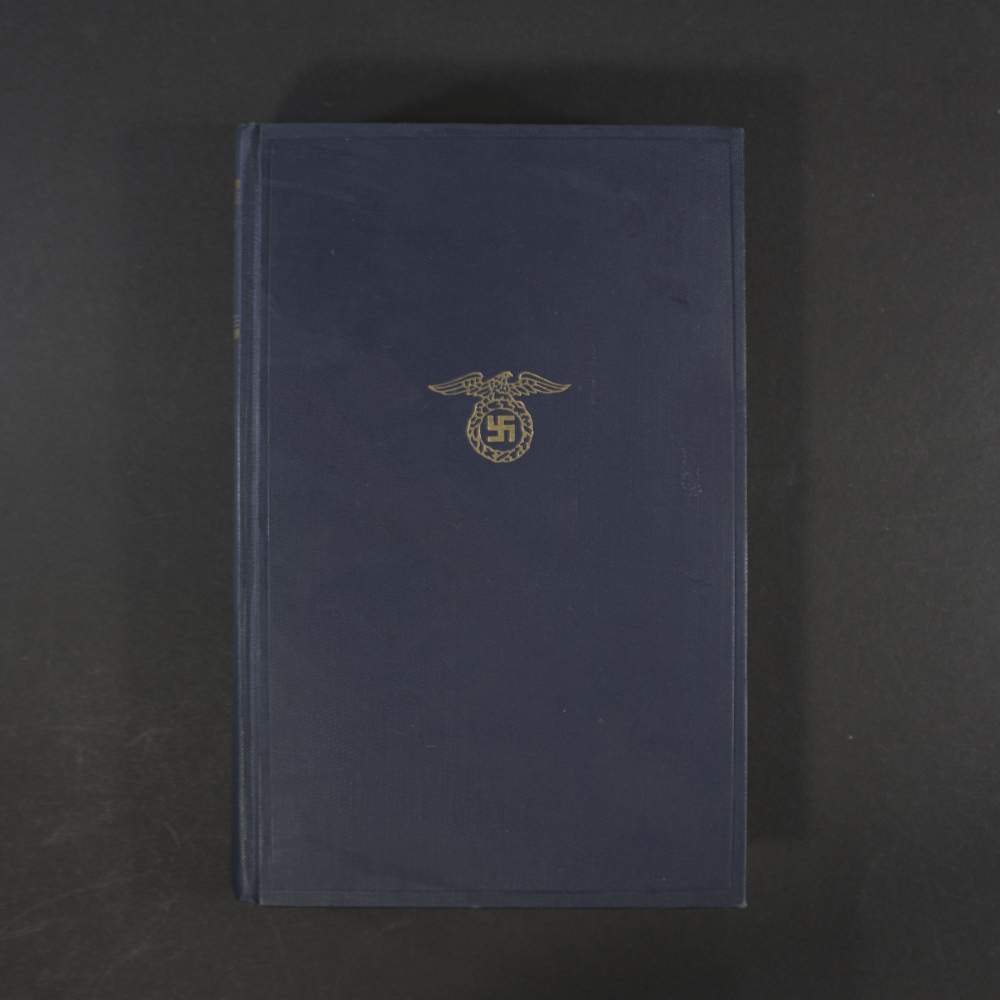 Front cover of a WWII German Mein Kampf People's Edition (Volksausgabe). The hardcover book displays period-era binding and typography, with visible age-related wear, handling marks, and a well-preserved historical appearance.