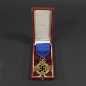Overview of a cased German 40 Years Faithful Service Medal, showing the medal, ribbon, and presentation case together.