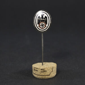 Overview of a DDAC (Der Deutsche Automobil-Club) membership pin, showing the complete badge and its overall condition.