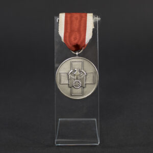 Overview of a Nazi Germany Volkspflege medal, showing the complete award and its overall condition.