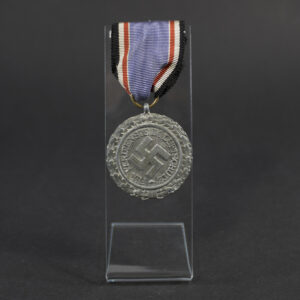 Front overview of a German World War II Luftschutz Medal, 2nd Class, showing the complete award and its overall condition.