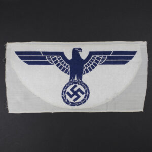 Overview of an original WWII 1st pattern Kriegsmarine Sport Breast Eagle, a rare German naval sports insignia in excellent condition.