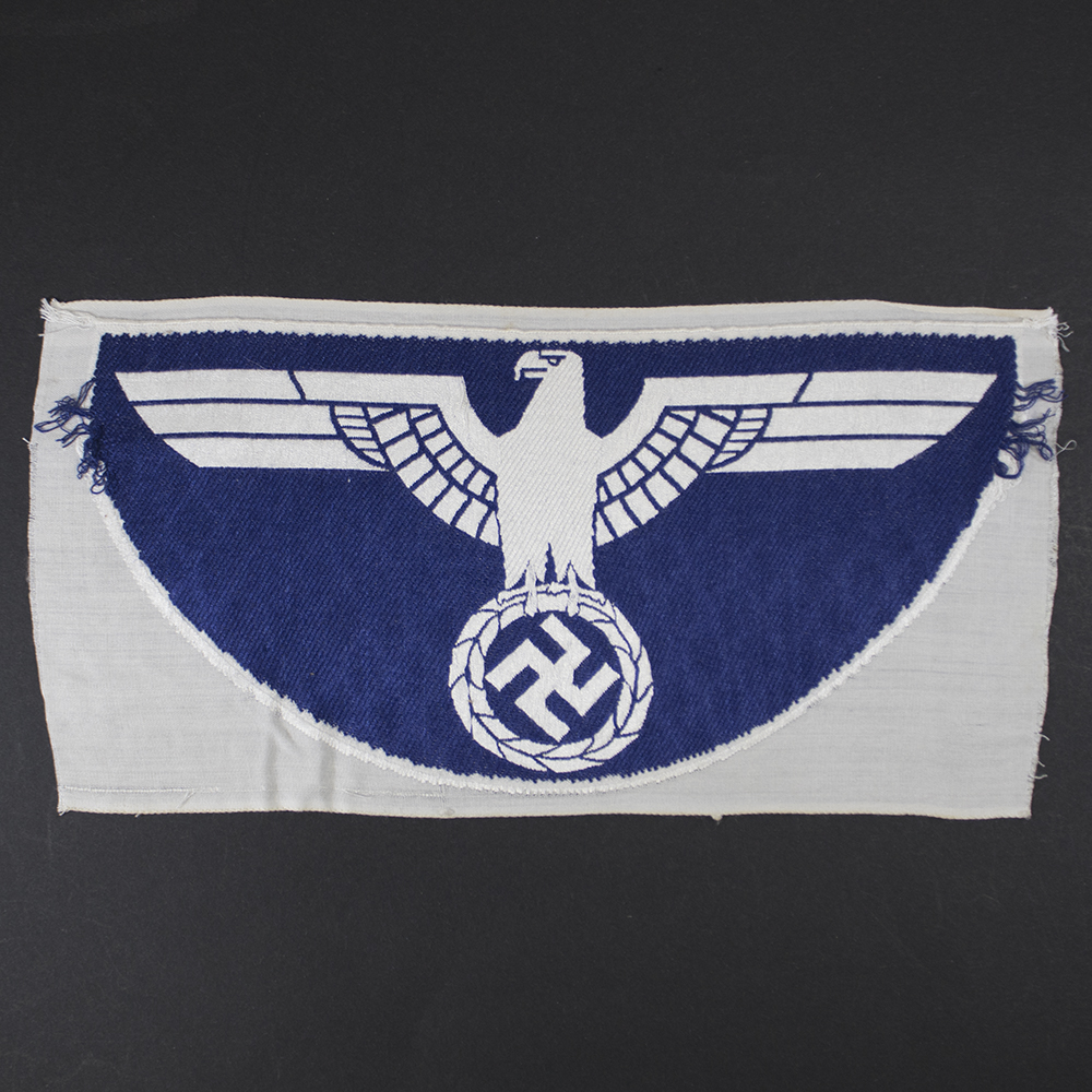 Reverse overview of an original Kriegsmarine Sport Breast Eagle displaying the backing material and period construction.