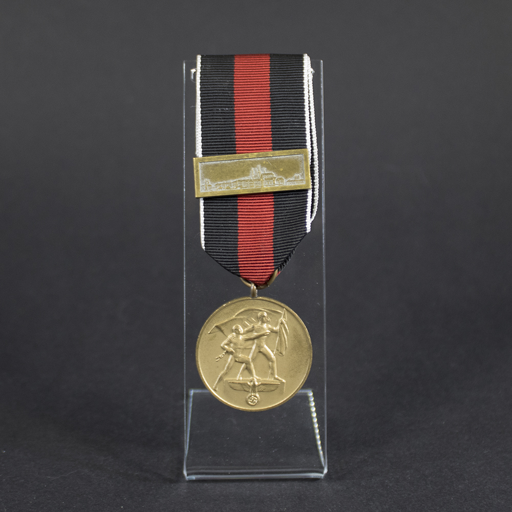 Sudeten Occupation Medal with Prague Bar, complete medal and ribbon in good condition