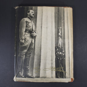 Front cover of the Adolf Hitler cigarette card album with original dust jacket, featuring portrait artwork and period design elements.
