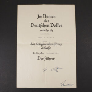 Front view of an original War Merit Cross 2nd Class without Swords award document, showing the printed award text, official design, and period signatures.