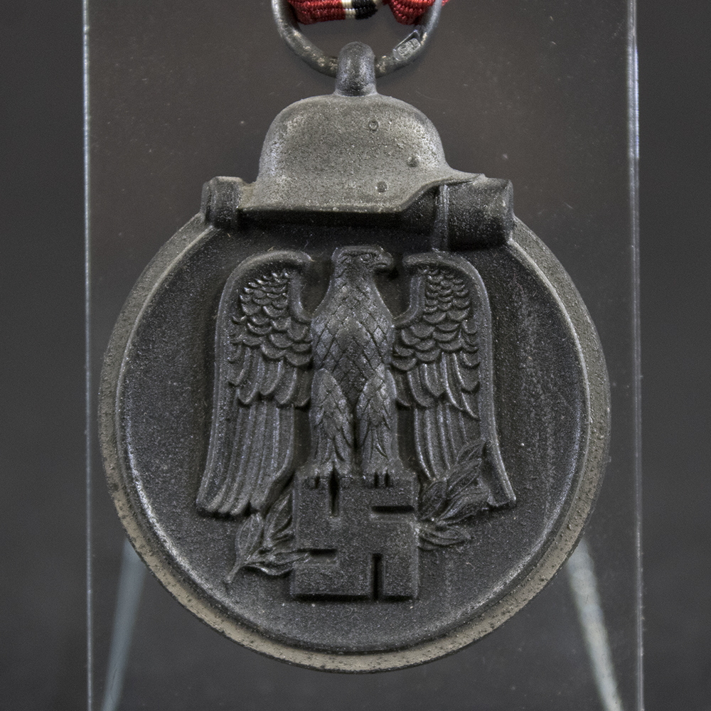 Close-up reverse view of the Eastern Front Medal, showing the commemorative inscription and original period finish.