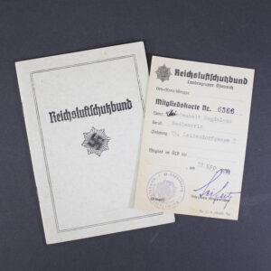 Front cover of an original Reichsluftschutzbund (RLB) membership booklet, featuring the organization's title and emblem on a light-colored cover.