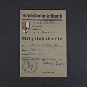 Front cover of an original Reichskolonialbund membership card, showing the organization title, membership details, official stamp, and handwritten signature.
