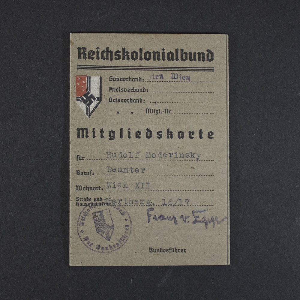 Front cover of an original Reichskolonialbund membership card, showing the organization title, membership details, official stamp, and handwritten signature.