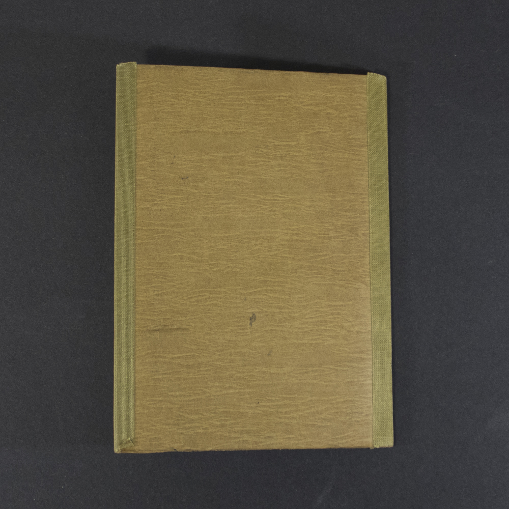 Back cover of an original German WWII Soldbuch, featuring the plain brown card exterior with cloth-reinforced spine edges and visible signs of age and use.