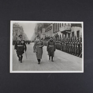 Original Adolf Hitler and Hermann Göring photo postcard featuring a ceremonial honor guard inspection. Authentic WWII-era German collectible.