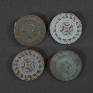 WWII German WHW Sophienhof Pommern set of four round plastic tinnies front view