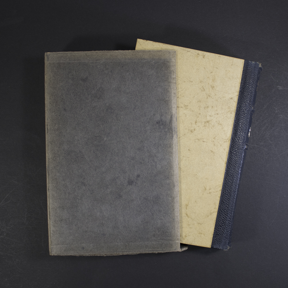 1941 German Mein Kampf Hochzeitsausgabe book emerging from its original grey protective slipcase