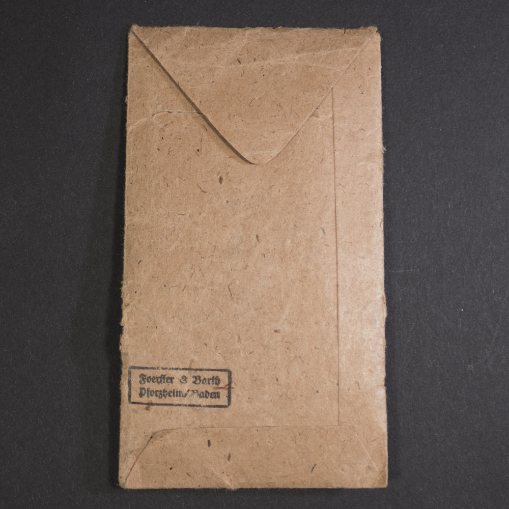 WWII German War Merit Cross 2nd Class paper packet reverse showing maker stamp